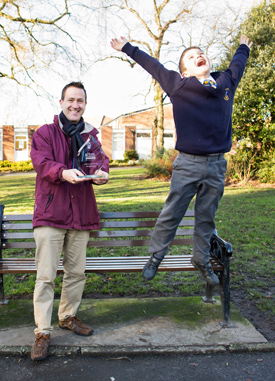 Home Instead Senior Care’s CAREGiver of the Year, Mike Bradbury and son Thomas.